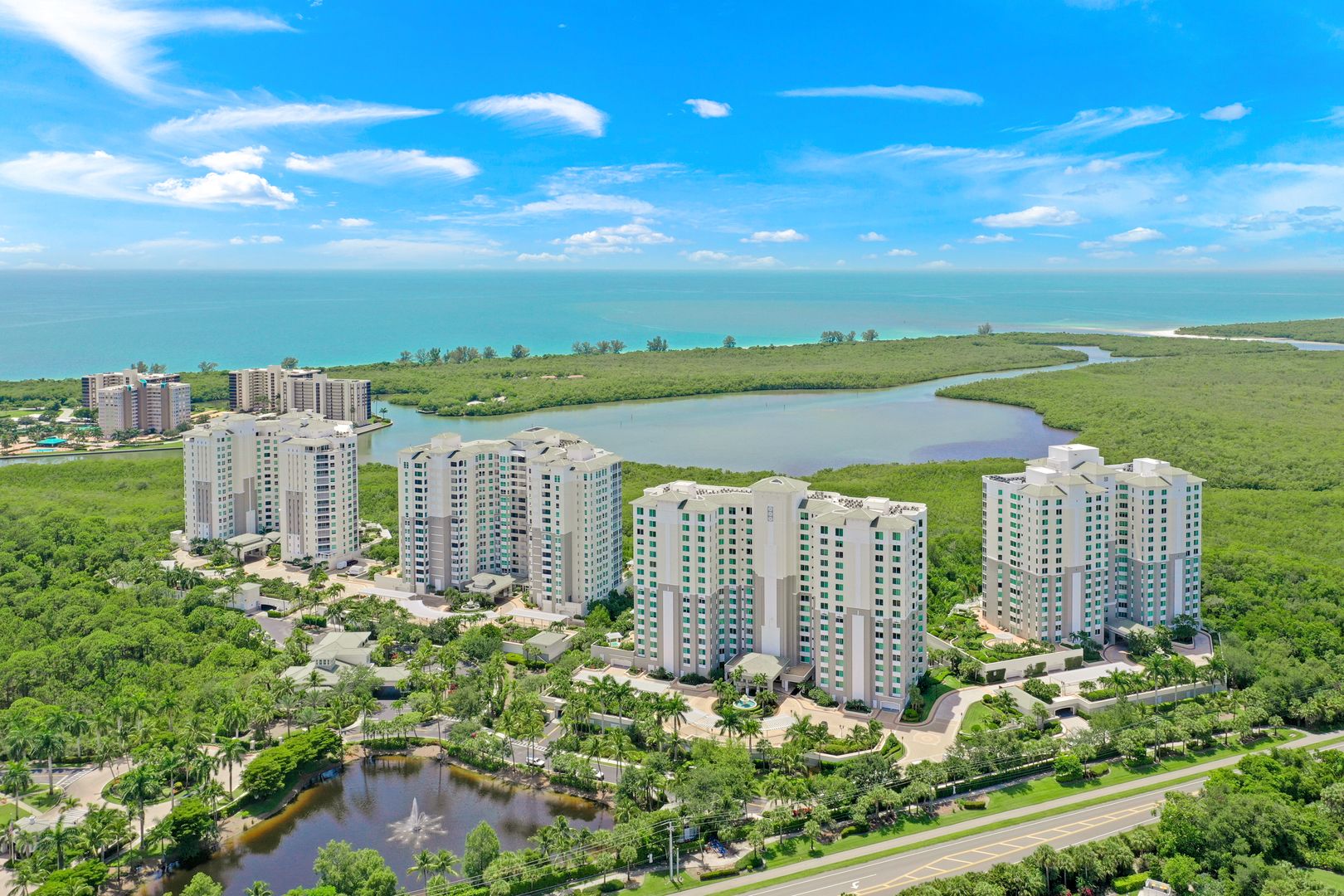 Grande Preserve towers overlooking the Gulf and preserve at The Dunes of Naples